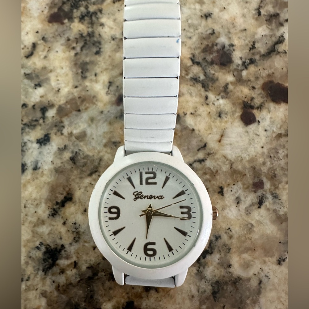 Geneva white women’s watch with stretch band.